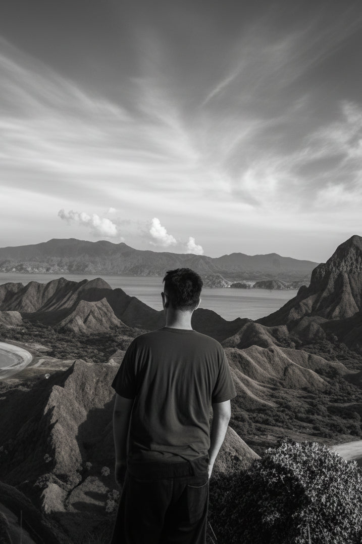 Darwin on a ridge above the water, facing away