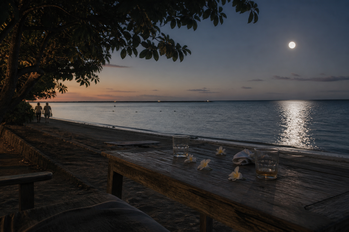 Sanur shoreline under a rising full moon as afternoon light fades