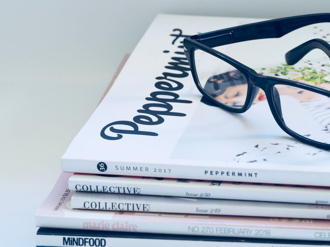 A stack of printed magazines
