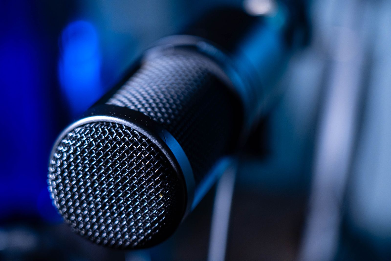 A studio microphone in warm light