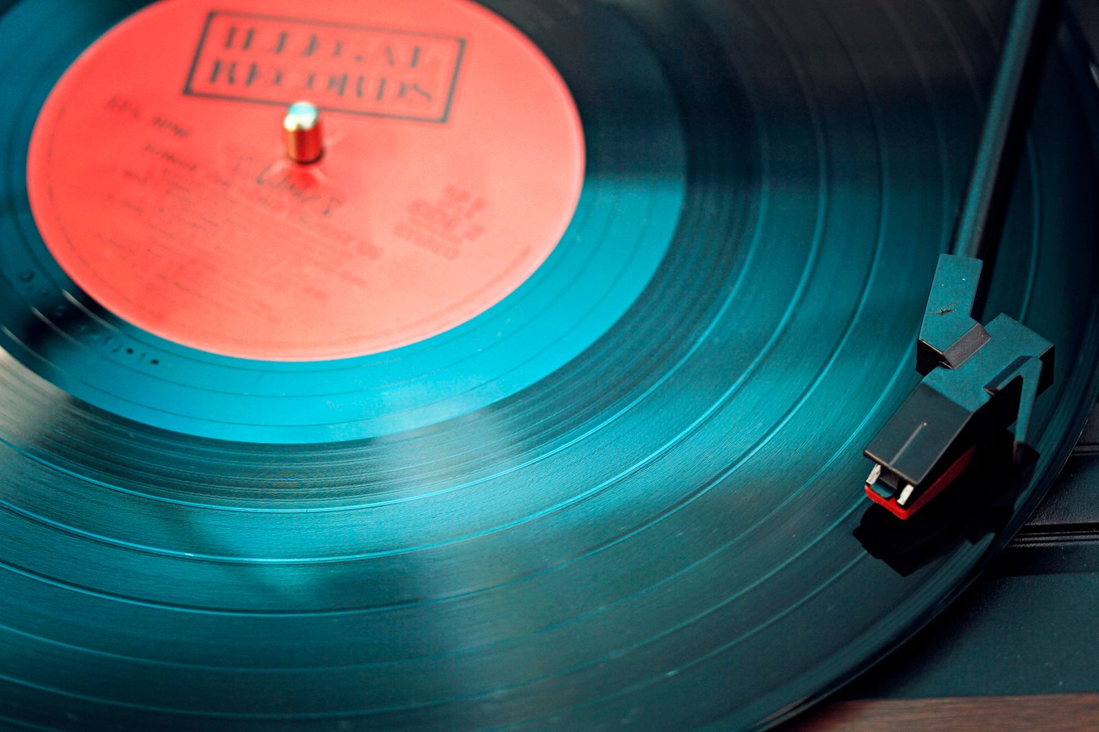 A vinyl record spinning on a turntable