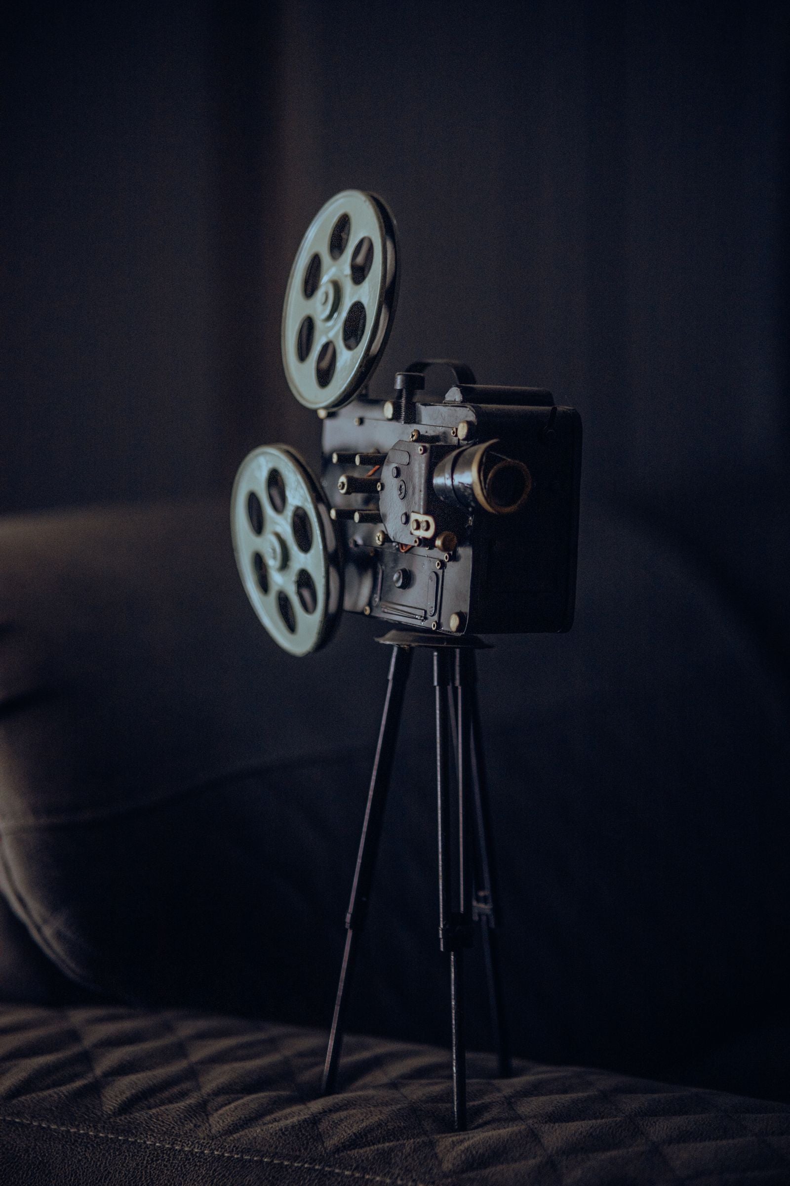 A vintage film camera in low light
