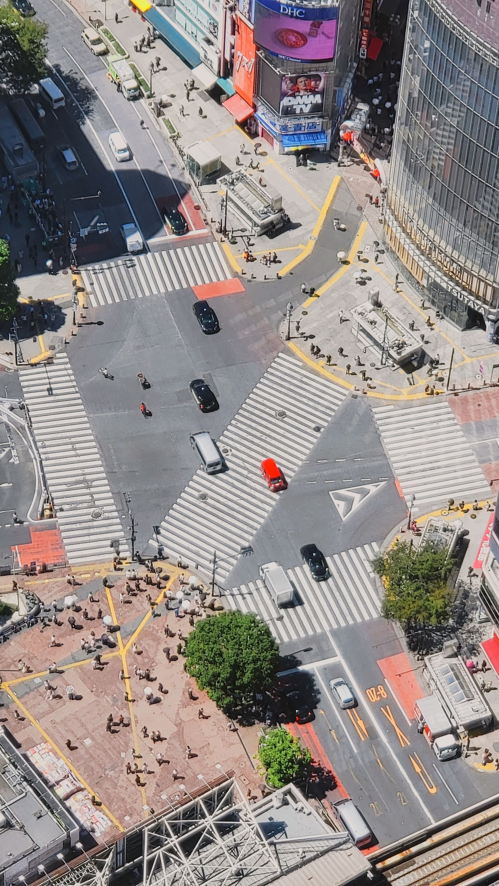 Crowds crossing the Shibuya intersection in Tokyo
