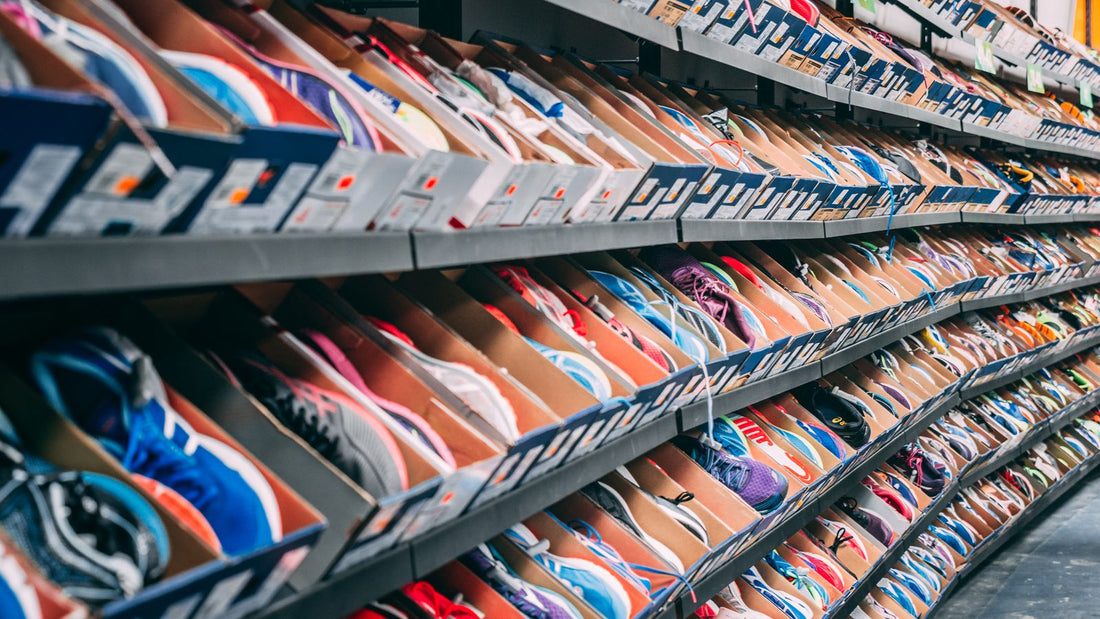 Shoe boxes stacked on shelves