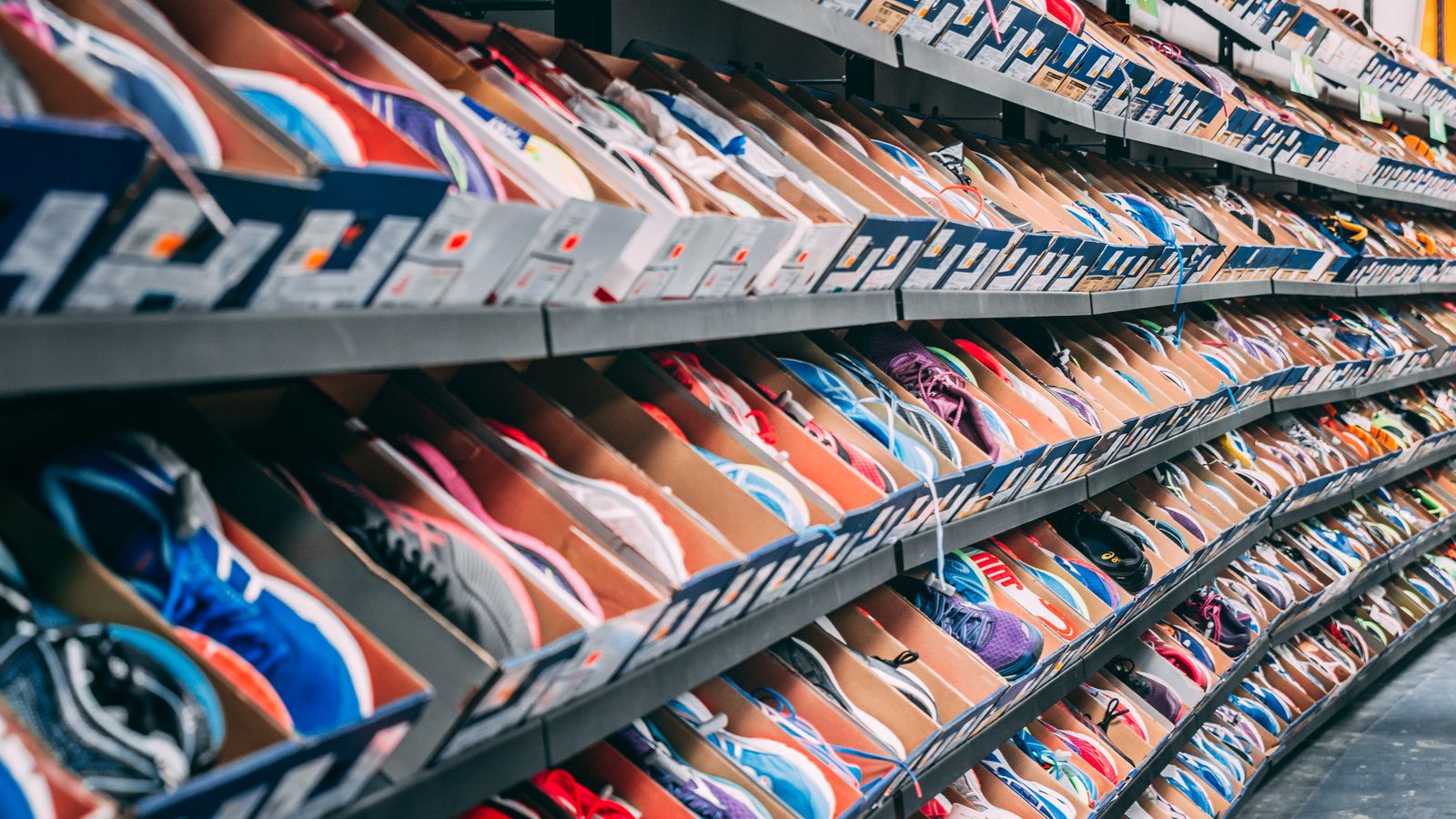 Shoe boxes stacked on shelves