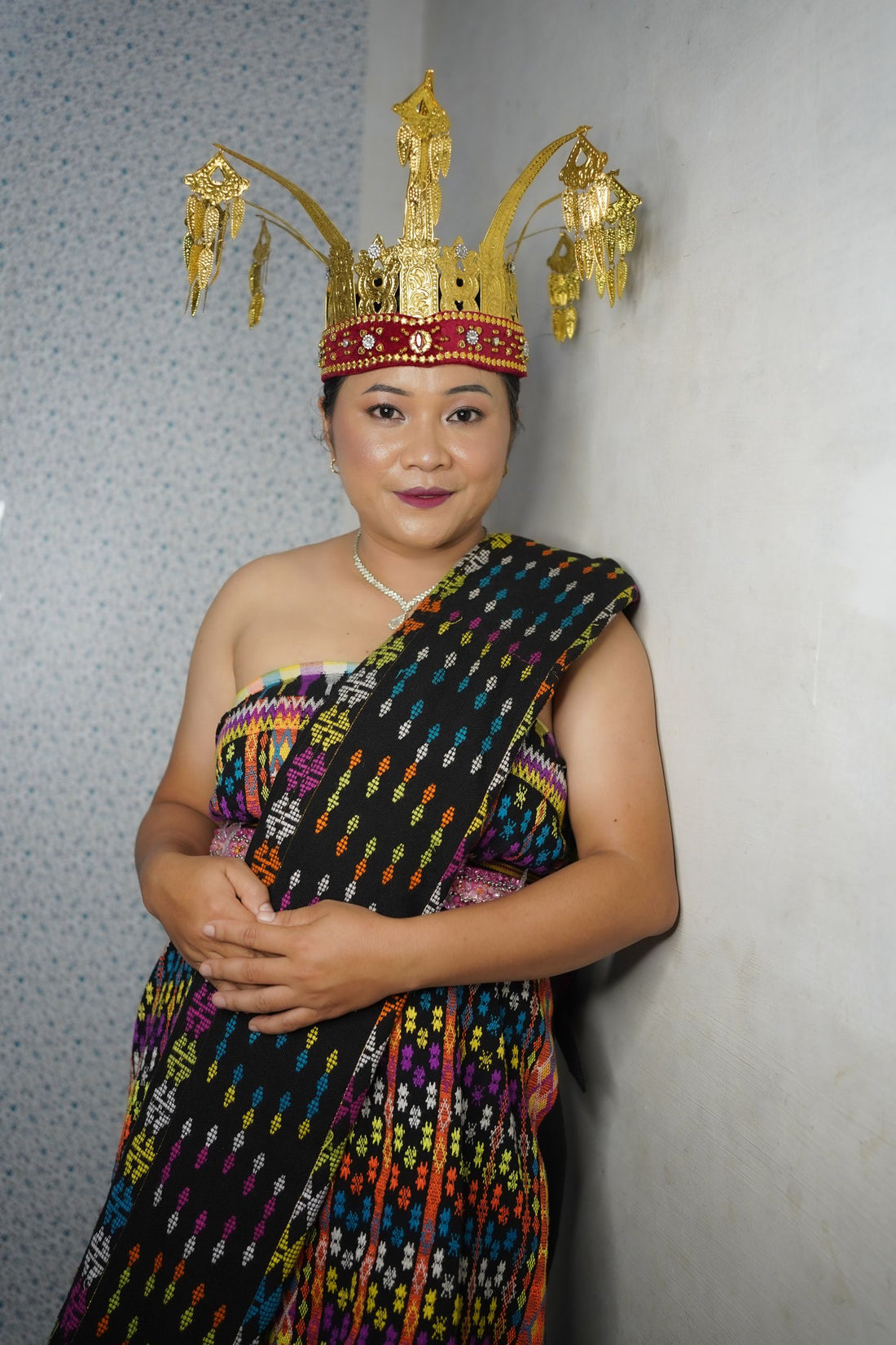 A portrait in traditional East Nusa Tenggara woven attire