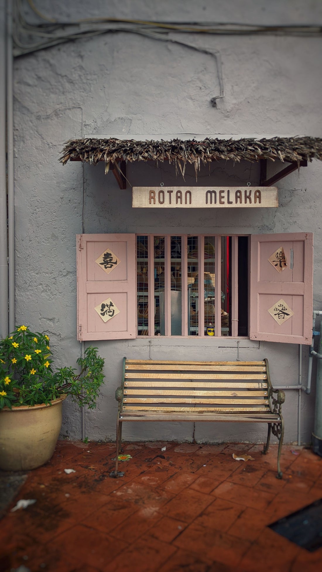 An old shophouse window in Malacca