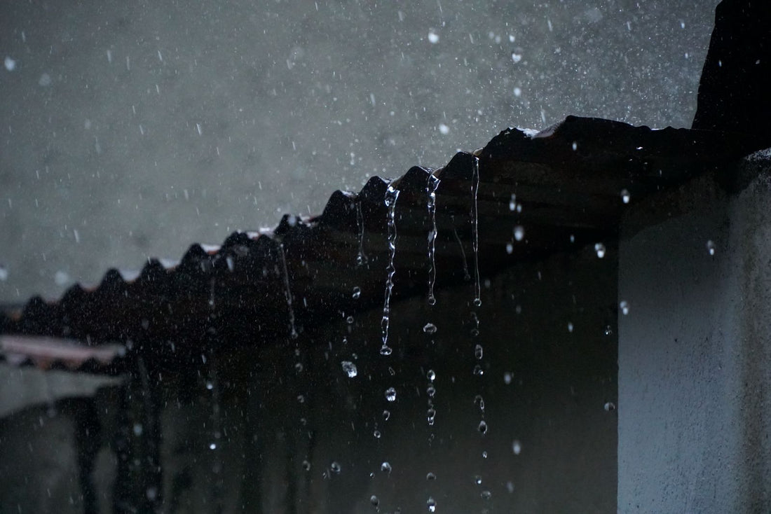 Rain falling on a metal roof